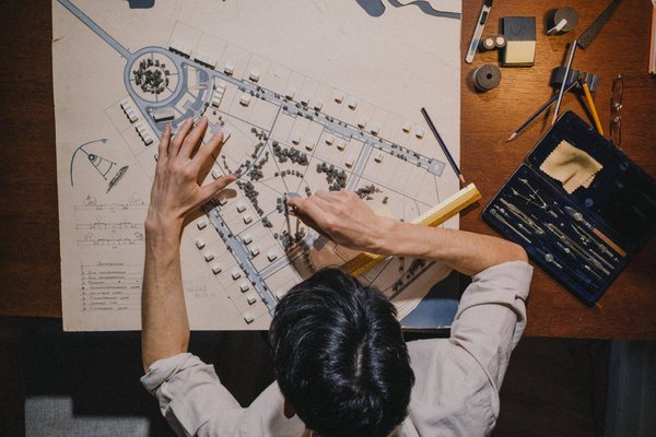 How to design real estate projects that can adapt to changing environmental regulations and standards?