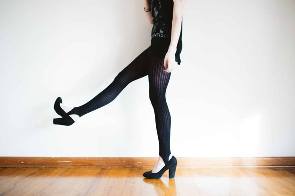 How Can You Enhance a Simple Outfit with Textured Tights or Socks?